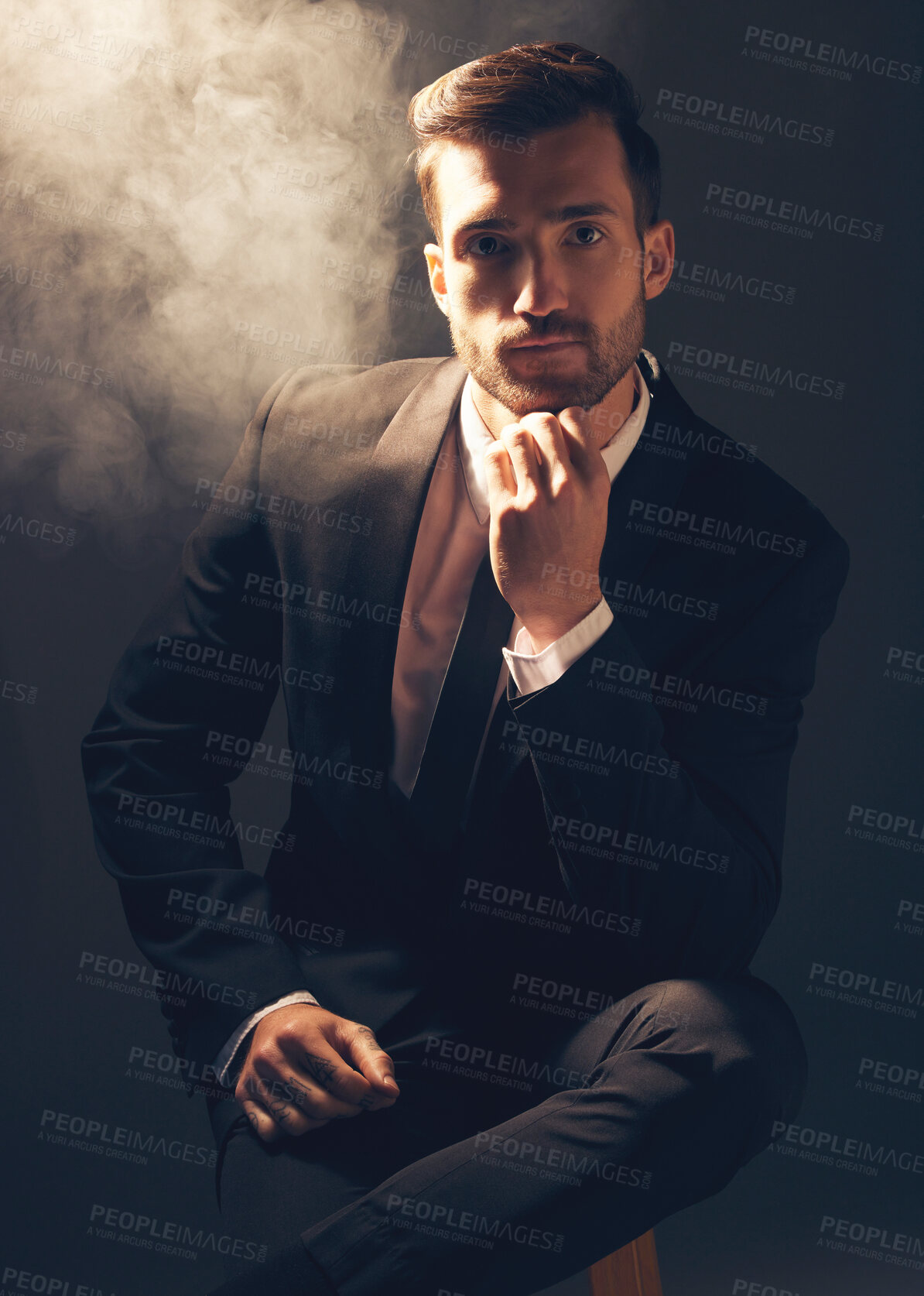 Buy stock photo Portrait, smoke and man in suit, fashion and stylish guy against dark studio background. Face, male leader and gentleman with confidence, manager and leader for business, elegant outfit and executive