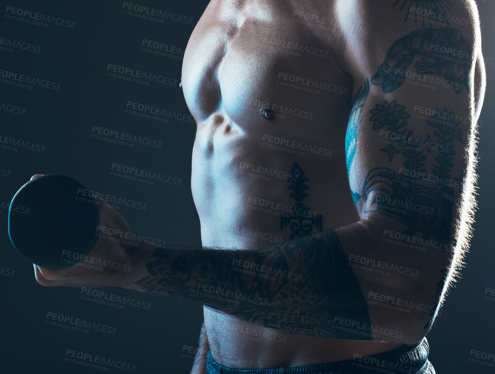 Buy stock photo Fitness, body and man with dumbbell in hand on blue background, isolated neon blue light and muscular chest. Sports, muscle and male model in artistic dark studio for power workout and gym aesthetic.