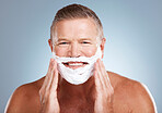 Shaving cream, portrait and happy old man in studio for skincare, grooming and beauty on grey background. Face, foam and hair removal for mature model smile for facial, skin or product while isolated