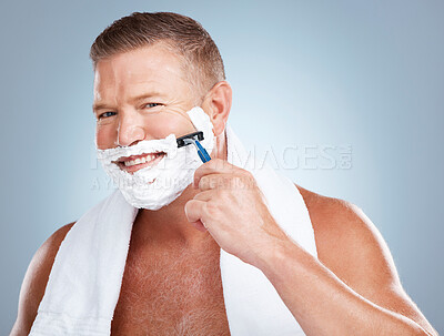 Buy stock photo Razor shave, man smile and portrait with cream for face cleaning, wellness and skincare. Morning grooming, foam and model with facial care and skin treatment for shaving hair in a studio isolated