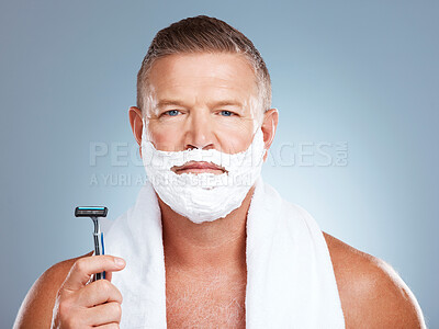 Buy stock photo Portrait, razor and old man shaving in studio with foam, skincare or beauty on grey background. Face, blade and mature male model relax for luxury, hair removal and facial, skin and product isolated