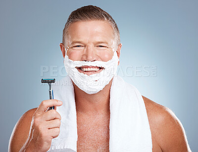 Buy stock photo Shaving foam, happy man and portrait with cream and razor for face cleaning, wellness and skincare. Morning grooming and model with facial care and skin treatment to shave hair in a studio isolated