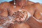 Water splash, zoom and black man cleaning hands, health, wellness and hygiene in studio. Fresh, clean and shower to wash bacteria from hand and skin, dermatology, germs and male skincare treatment.