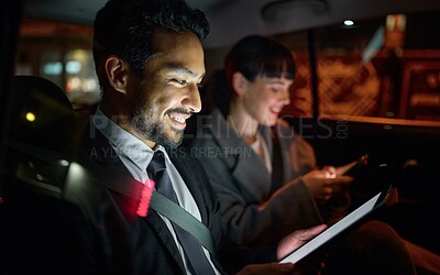 Buy stock photo Tablet, business people and man travel in car while on social media, internet browsing or web scrolling. Transport, night and male and woman with mobile technology for networking, typing or texting.