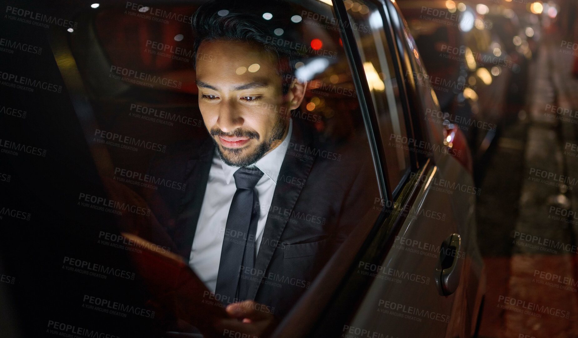 Buy stock photo Travel, tablet and business man in car on social media, internet browsing or working. Transport, night and young male professional with digital technology for networking, web scrolling or research.