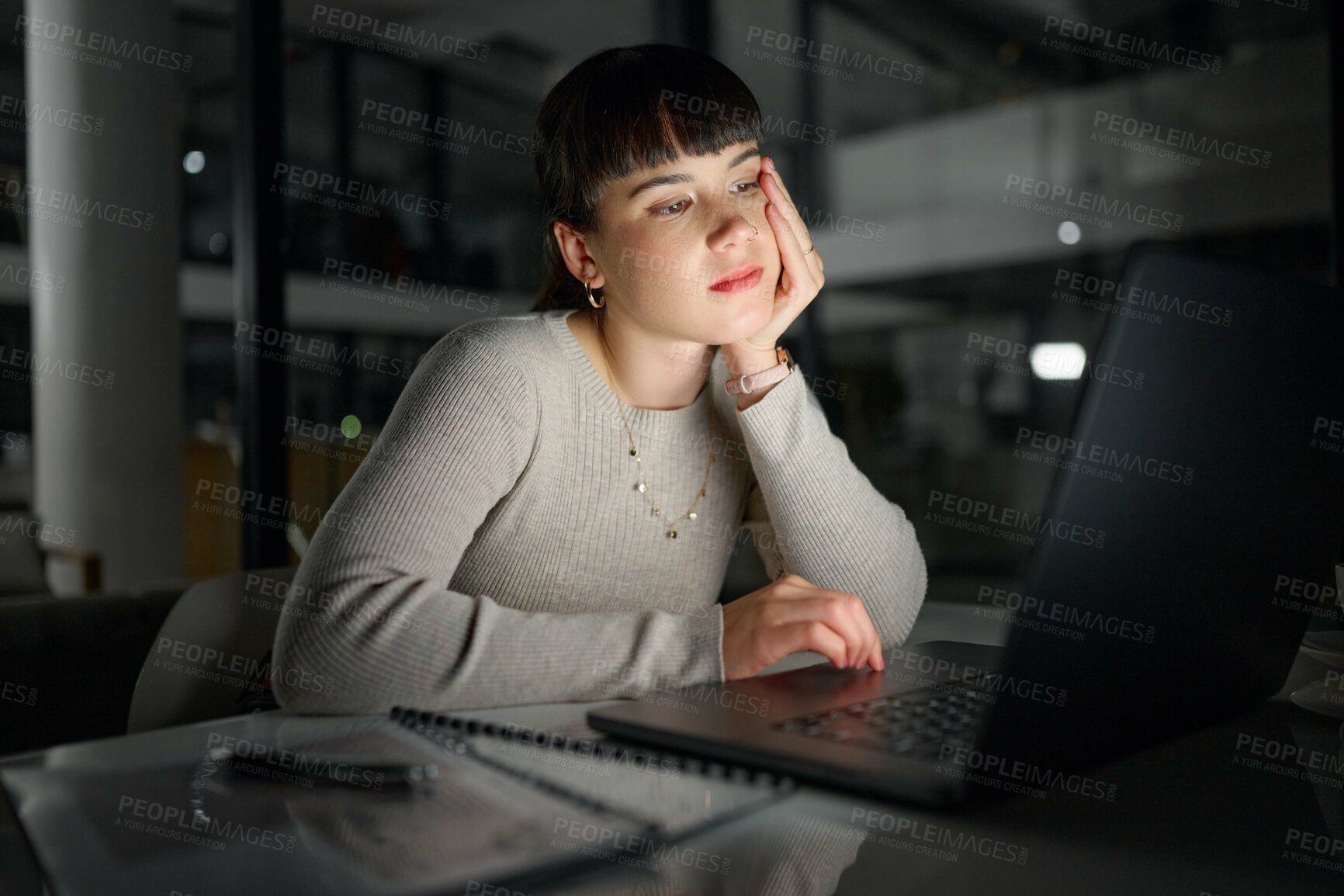 Buy stock photo Depression, bored or woman typing on laptop for online report, research or business proposal in an office. Burnout, lazy or tired worker reading sad news online, email or scrolling on social media 