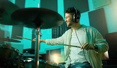 Buy stock photo Music, drums and band with a man musician in a studio for a recording, performance or practice. Art, instrument and sound with a young male drummer expressing musical or artistic talent in a studio