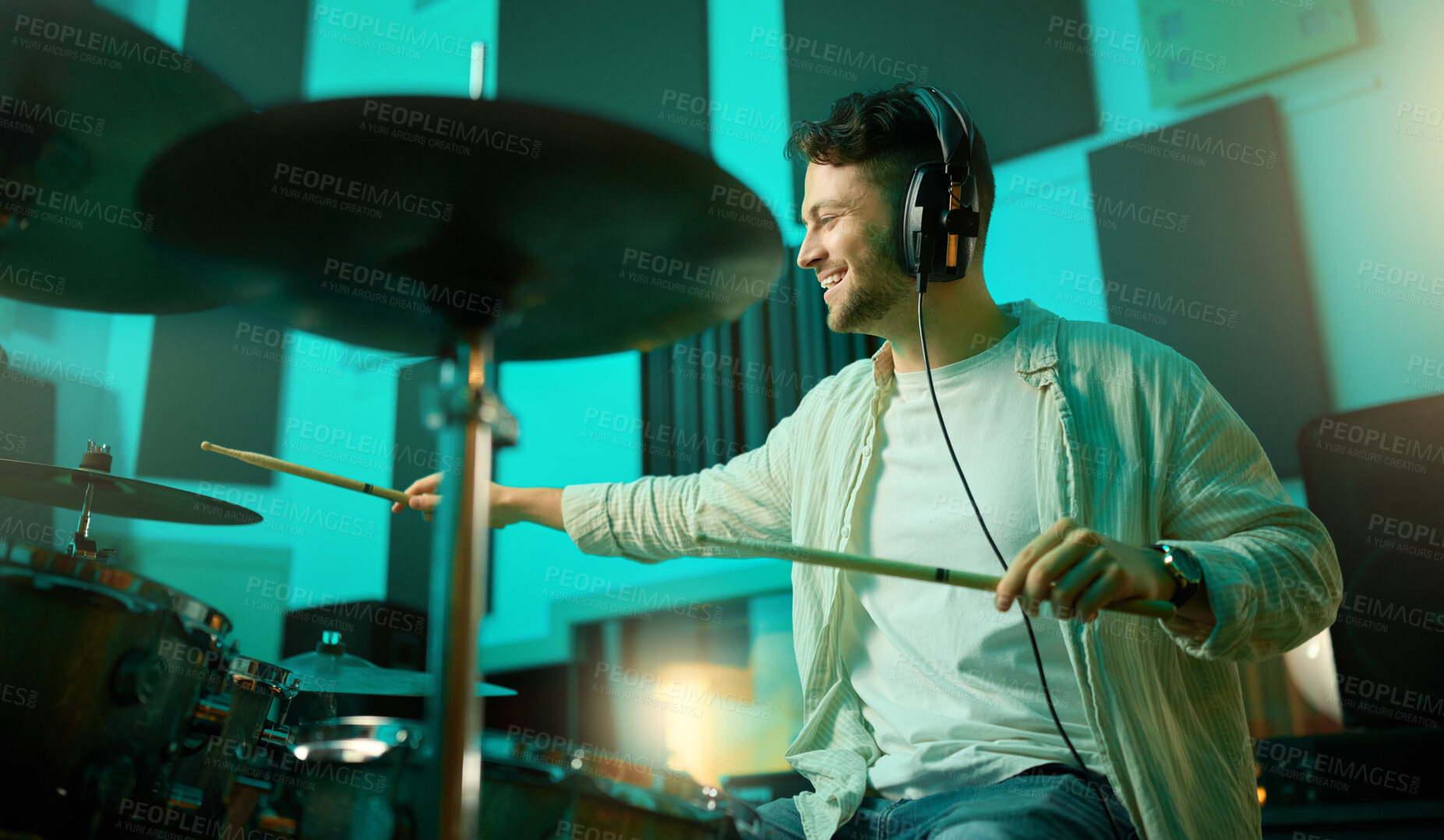 Buy stock photo Music, drums and band with a man musician in a studio for a recording, performance or practice. Art, instrument and sound with a young male drummer expressing musical or artistic talent in a studio