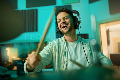 Buy stock photo Musician, headphones and man drummer playing in a recording studio for production of a song. Musical artist, drums and male with a passion for music with a percussion instrument for entertainment.