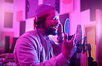 Musician, singing or black man on neon studio microphone, music equipment or practice in night theatre recording. Singer, person or artist on production, voice or sound performance in light theater