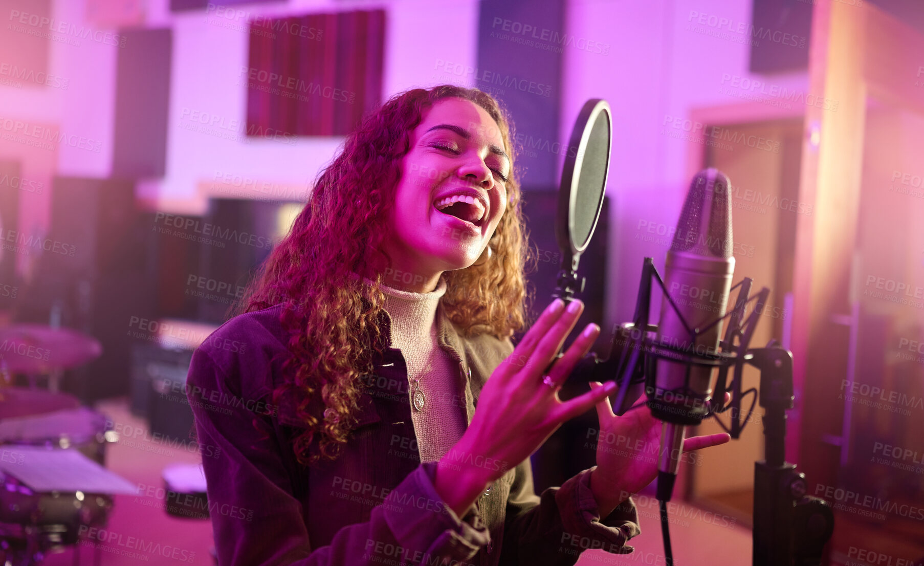 Buy stock photo Musician, singing or woman on neon studio microphone, music equipment or practice in night theatre recording. Singer, person or artist on production, voice media or sound performance in light theater