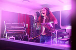 Technology, singing or musician on neon studio microphone, music lyrics or songwriting app in night recording. Singer, woman or artist on tablet in production, voice media or sound light performance