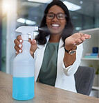 Hand, covid and sanitizer with a business black woman in her office, sitting at a desk with her spray bottle. Health, safety and cleaning with a female employee using chemical disinfectant at work