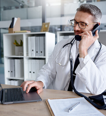 Buy stock photo Laptop, man and doctor on phone call, talking or chatting to contact for consultation in hospital. Telehealth, telephone and mature male medical professional networking, conversation or discussion.