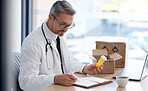 Writing doctor, pills or order box in medical delivery, prescription logistics or medicine shipping ideas for customer. Man, healthcare or worker and retail drugs, notebook research or export package