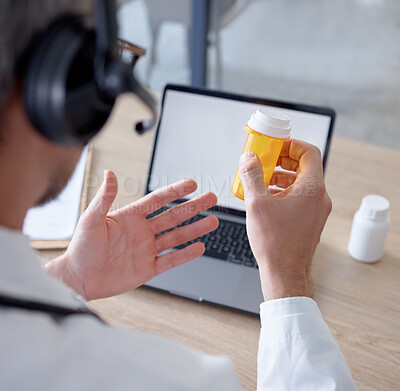 Buy stock photo Pills, headphones and doctor on laptop video call, webinar or online consultation. Computer telehealth, medication and hands of man with drug product, medicine or prescription on internet conference.