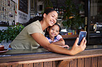Coffee shop, black family and selfie with a mother and daughter enjoying time together in a cafe. Photograph, picture and memories with a woman and happy female child bonding in a restaurant