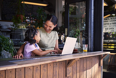 Buy stock photo Black family, coffee shop or laptop with a mother and daughter together in the window of a restaurant. Kids, computer or education with a woman and female child sitting or bonding in a internet cafe