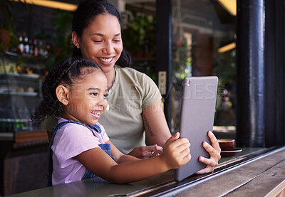 Buy stock photo Video call, selfie and mother and girl with a tablet in a restaurant on social media, online and app at a coffee shop. Kid, daughter and child with woman on the internet for communication and talking