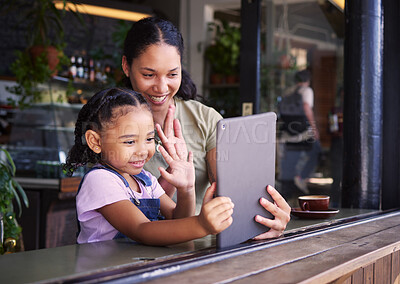 Buy stock photo Video call, restaurant and woman and girl with a tablet waving on social media, online and app at a coffee shop. Kid, daughter and child with parent on the internet for communication and talking