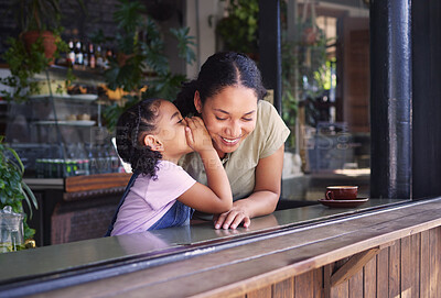 Buy stock photo Secret, children and a black family in a coffee shop with a girl whispering in the ear of her mother. Kids, gossip and whisper with a secretive female child telling her mom a mystery in a cafe