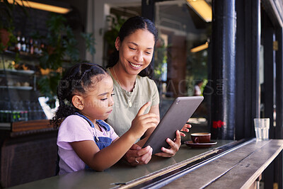 Buy stock photo Tablet, coffee shop and happy mother with her child reading the online menu before ordering. Technology, internet and mom on a date with her girl kid with a touchscreen mobile device in a cafe.