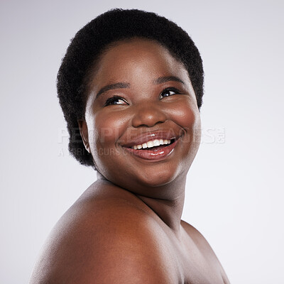 Buy stock photo Face, thinking and beauty with a model black woman in studio on a gray background for skincare. Idea, skin and happy with a plus size young female posing indoor for natural care or body positivity