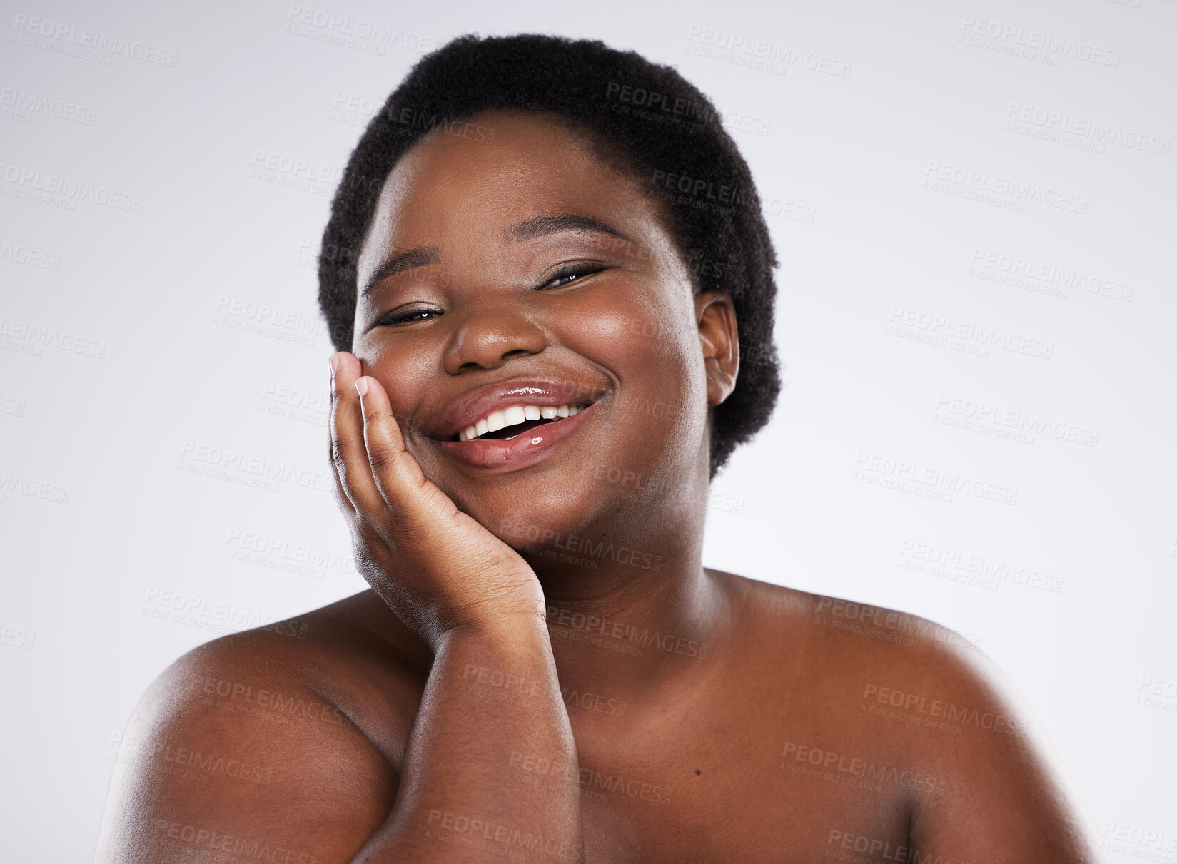 Buy stock photo Black woman, hand and smile for skincare beauty, cosmetics or makeup against gray studio background. Portrait of happy natural plus size African American female smiling for self love, care or facial