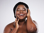 Black woman, beauty and portrait of a young woman with skincare glow from dermatology. Facial, wellness and cosmetics with a model in isolated, gray background and studio laughing with happiness