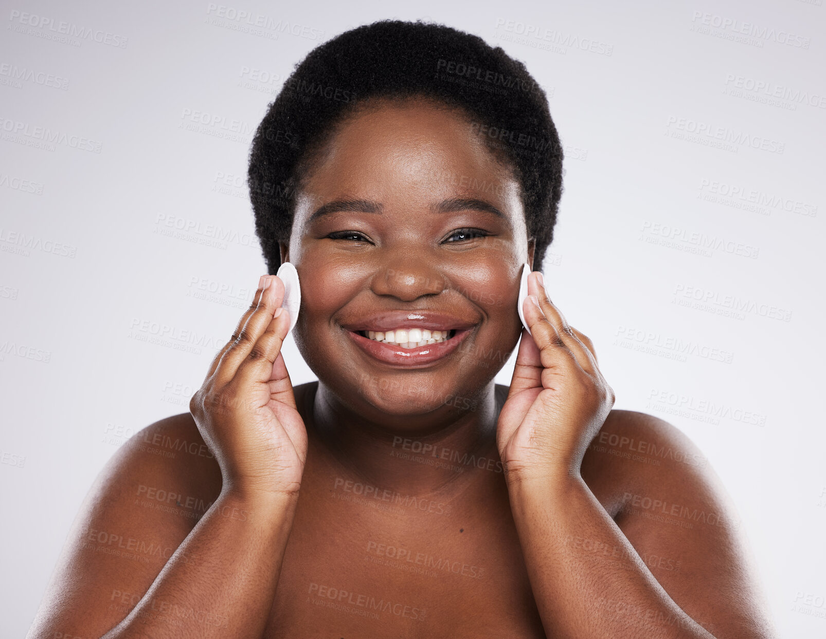 Buy stock photo Black woman, skincare and studio portrait with cotton pad for cleaning, skin glow or wellness with smile. African model, cosmetics and makeup for dermatology, aesthetic or facial health for self care