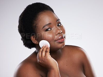 Buy stock photo Portrait, makeup and black woman with cotton pad, dermatology and girl on grey studio background. Face, African American female and lady with cosmetics, confidence and facial cleaning on backdrop