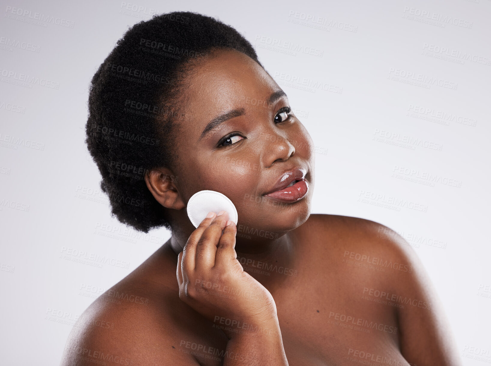 Buy stock photo Portrait, makeup and black woman with cotton pad, dermatology and girl on grey studio background. Face, African American female and lady with cosmetics, confidence and facial cleaning on backdrop