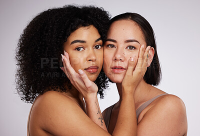 Buy stock photo Beauty, facial and portrait of women for skincare, spa wellness and dermatology in white studio. Diversity, self care and face of Asian and black girl for luxury cosmetics, makeup and natural glow