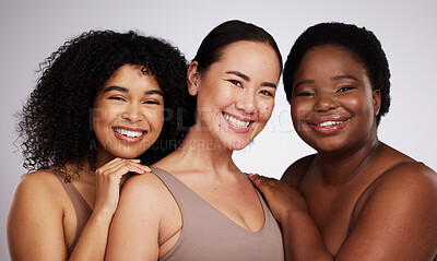 Buy stock photo Portrait, diversity and women with skincare, smile and bonding together on grey studio background. Face, multiracial and females with cosmetics, support or solidarity with body positivity on backdrop