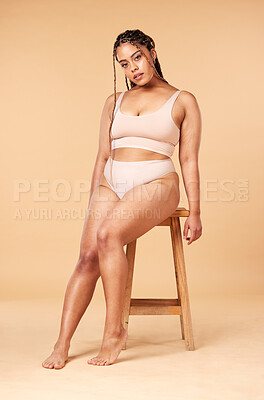 Buy stock photo Woman sitting, portrait with underwear and body, positivity and beauty, fitness and skin isolated on studio background. Health, wellness and happy with nutrition, cellulite and dermatology mockup