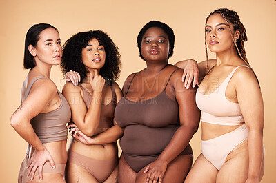 Body positive, diversity and portrait of women group together for  inclusion, beauty and power. Underwear model people or friends on beige  background for skincare, pride and motivation for self love