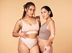 Portrait, beauty and black women with body positivity, skincare and self  love isolated in a studio brown background. Shape, plus size and female  models confident in underwear as wellness
