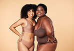Body positivity, beauty women and isolated on studio background in skincare, self love and empowerment. Underwear, lingerie and diversity black people or international model with inclusion portrait