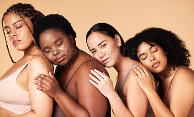Buy stock photo Hug, diversity and portrait of women in underwear for sleep isolated on a studio background. Friends, embrace and models with body positivity, lingerie and confidence in a collaboration on a backdrop