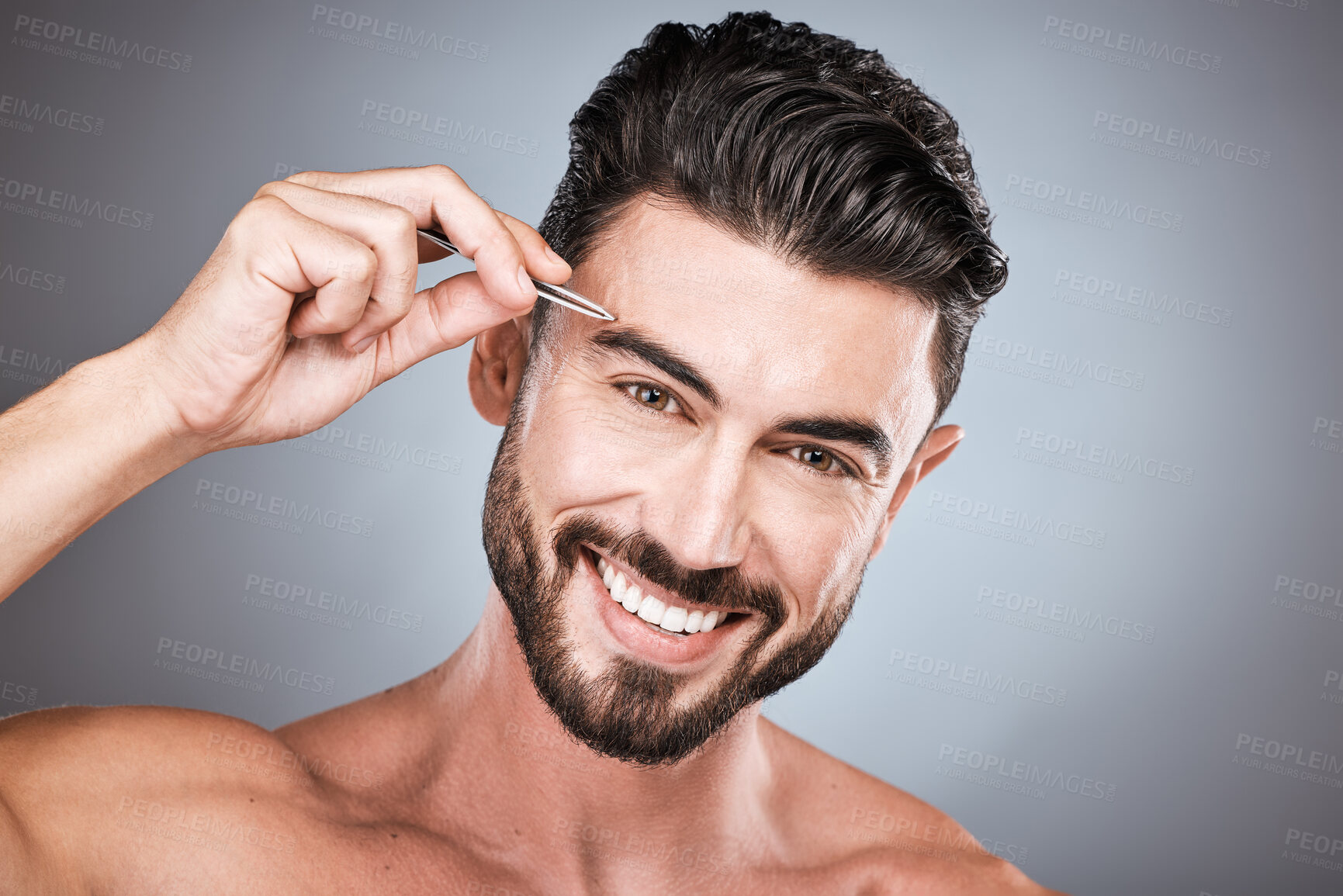 Buy stock photo Face, portrait and man with tweezers in studio isolated on a gray background for wellness. Health, hair removal and male model with product for plucking eyebrows for grooming, cleaning and hygiene.