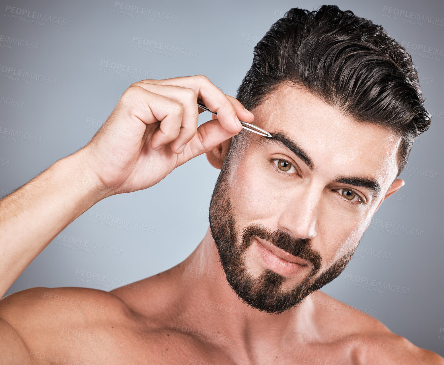 Buy stock photo Face, eyebrow and man with tweezers in studio isolated on a gray background for wellness. Health, hair removal and portrait of male model with facial product for grooming, cleaning and epilation.