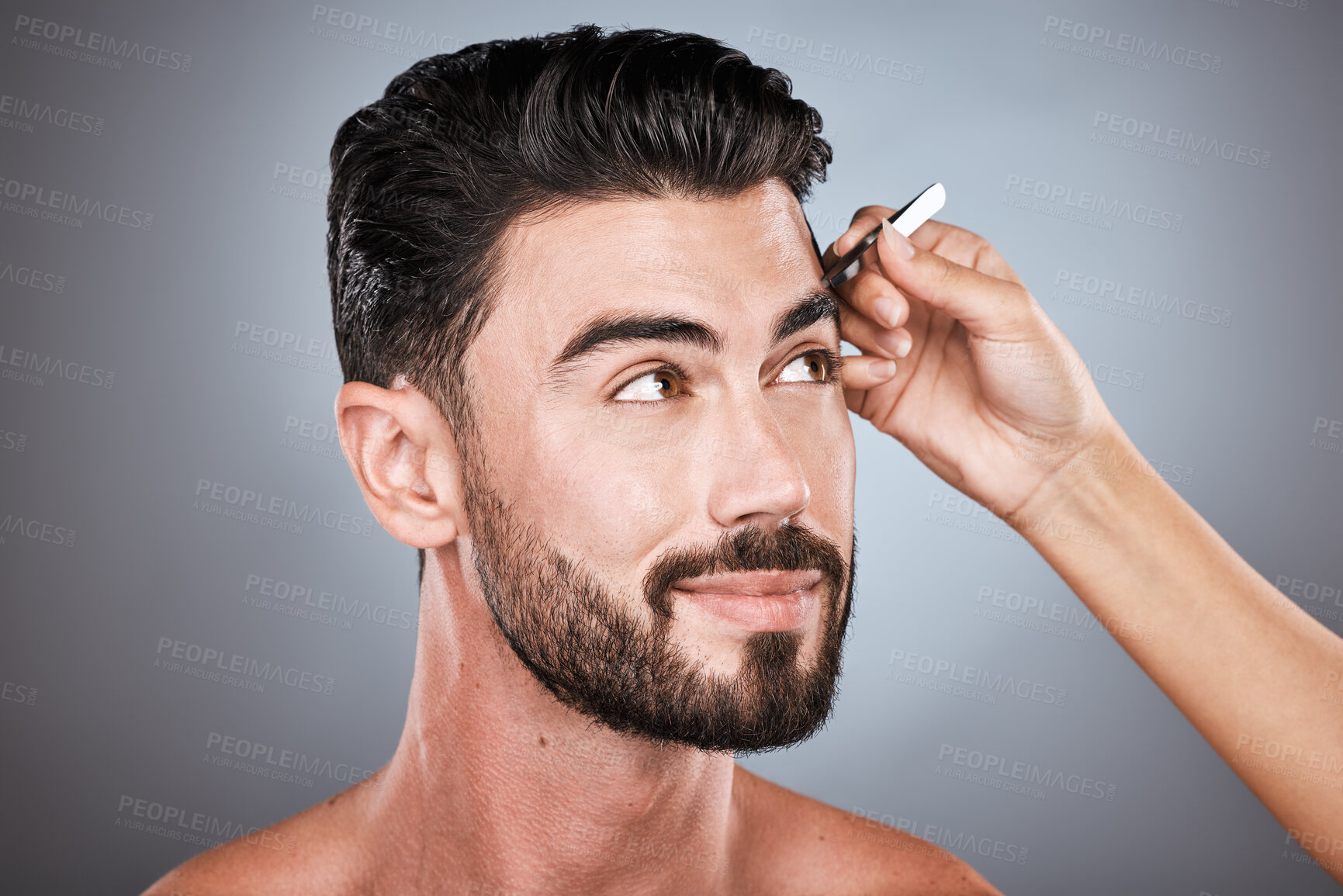 Buy stock photo Face, barber and man with tweezers in studio isolated on a gray background for wellness. Thinking, hair removal and male model with facial product to pluck eyebrows for grooming and beauty at salon.