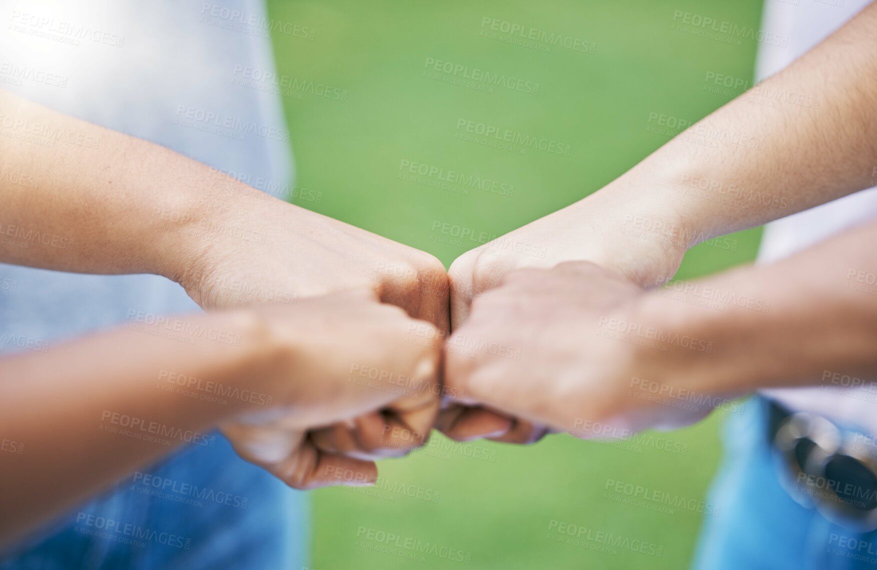 Buy stock photo People, hands and fist bump for community, trust or collaboration in partnership together in the outdoors. Hand of team bumping fists in unity for agreement, coordination or support in solidarity