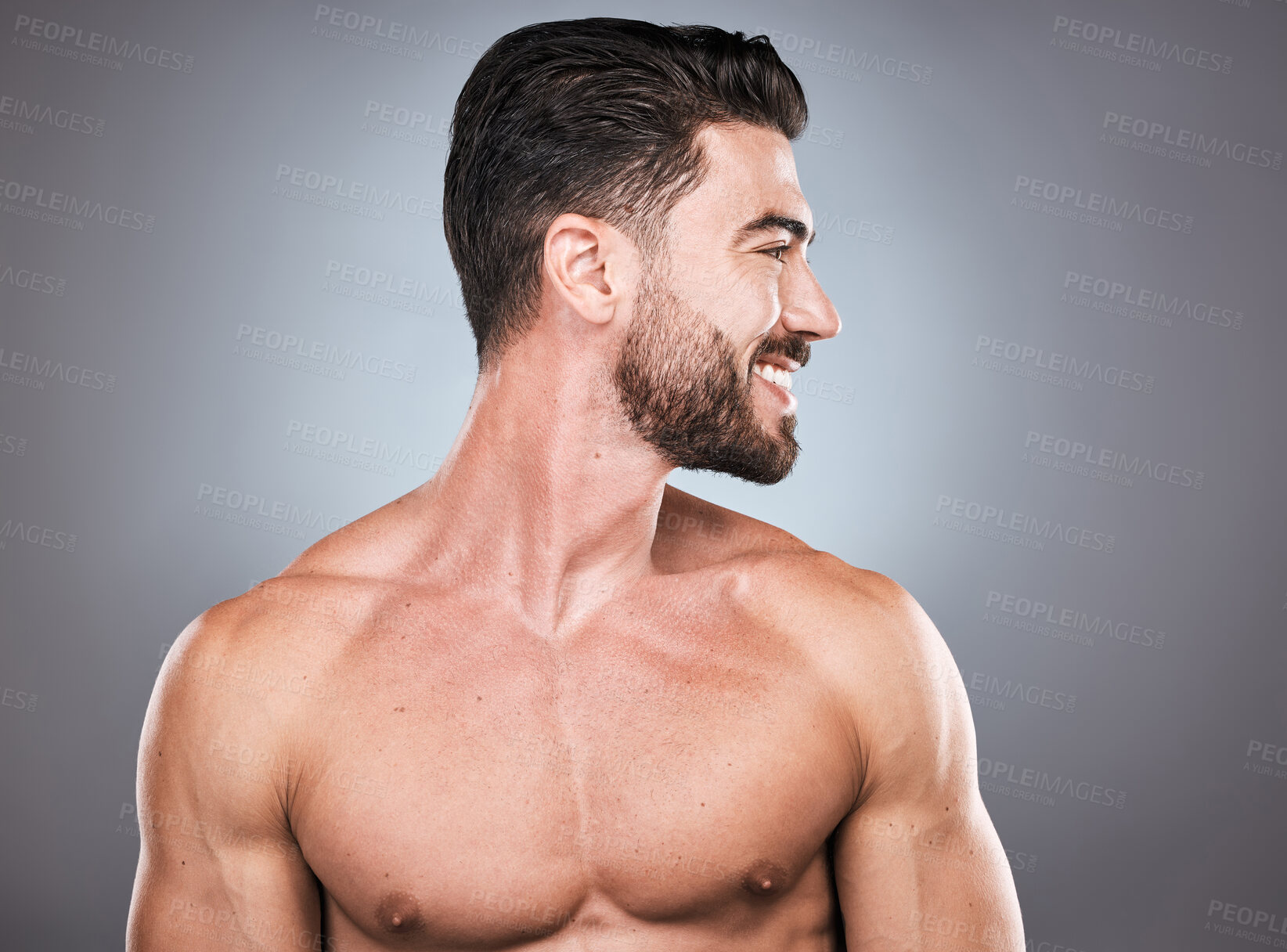 Buy stock photo Face, beard and skincare with a man model topless in studio  on a gray background for hygiene or grooming. Health, wellness and aesthetic with a muscular or handsome male posing shirtless indoor