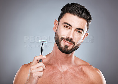 Buy stock photo Face, portrait and man with razor in studio isolated on a gray background for shaving. Skincare, cleaning and male model with facial product to shave for wellness, health hygiene and hair removal.