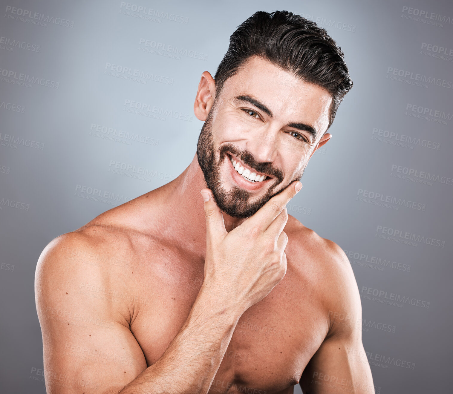 Buy stock photo Skincare, beard and facial, portrait of man with smile, hands on face and hair or beauty maintenance. Fitness, health and spa facial care, male model with muscle in studio isolated on grey background