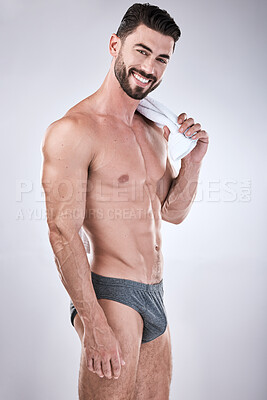 Fitness, body and beauty man isolated on a white background for exercise,  aesthetic and muscle goals. Underwear, sexy bodybuilder or sports person  portrait in health, wellness and workout abs success