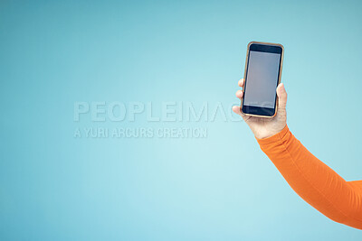 Buy stock photo Woman hand, mockup screen and phone space advertising sale, promotion or brand website or internet. Person with smartphone on blue background studio for about us, online deal or network connection