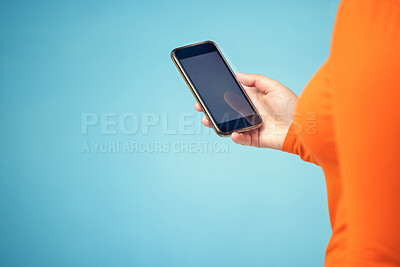 Buy stock photo Hand, mockup screen and woman phone for advertising sale, promotion or brand website on internet. Person with smartphone on blue background studio for about us, communication or network connection