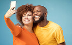 Couple, hug or bonding selfie on blue background, isolated mockup or wall mock up for social media. Smile, happy or black man and afro woman on photography technology for interracial profile picture